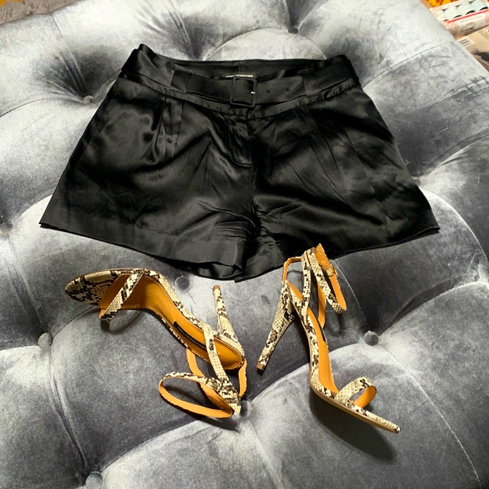 Silky black shorts with belt and pockets (93% silk; 7% spandex) never worn
